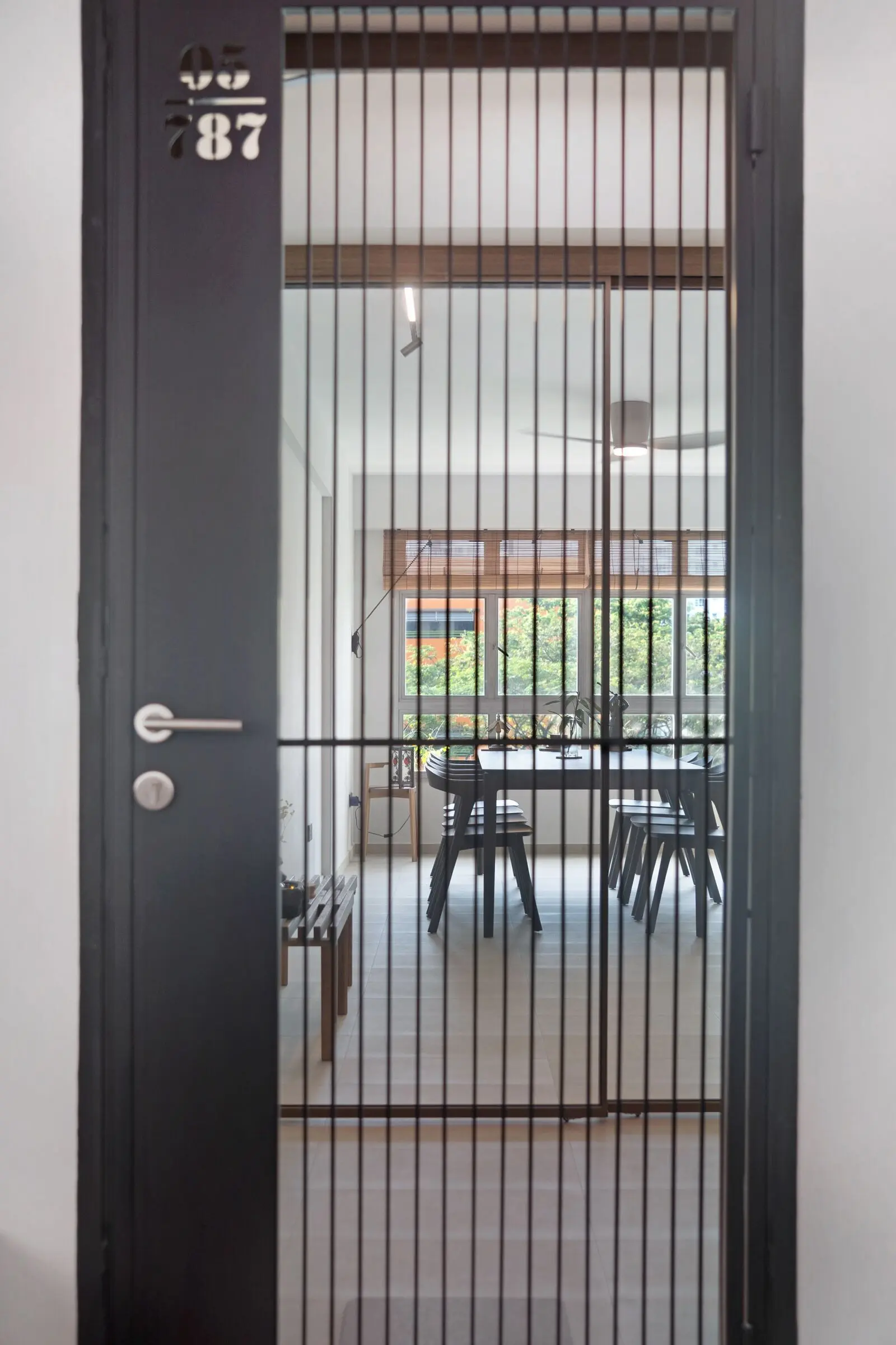 Vertical living and dining interior detail at 213C Punggol Walk