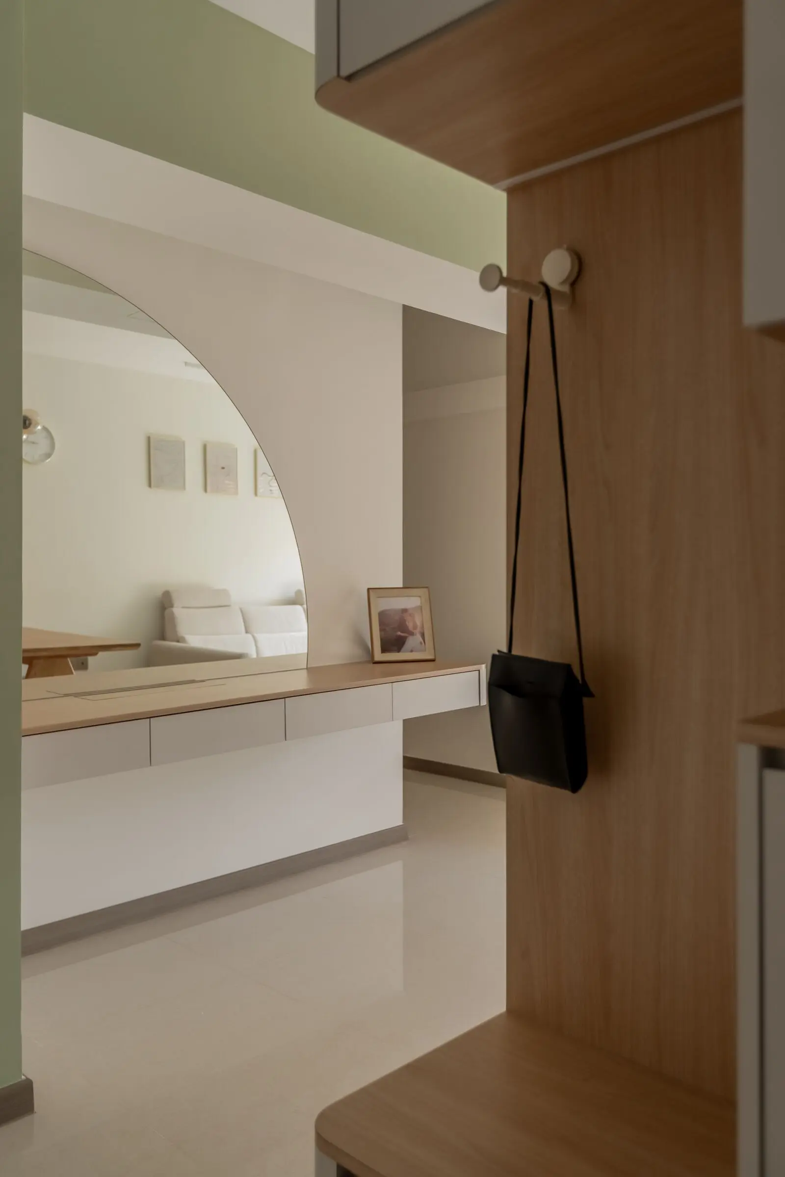 Vertical bedroom carpentry with green accent at 220B Tengah Garden