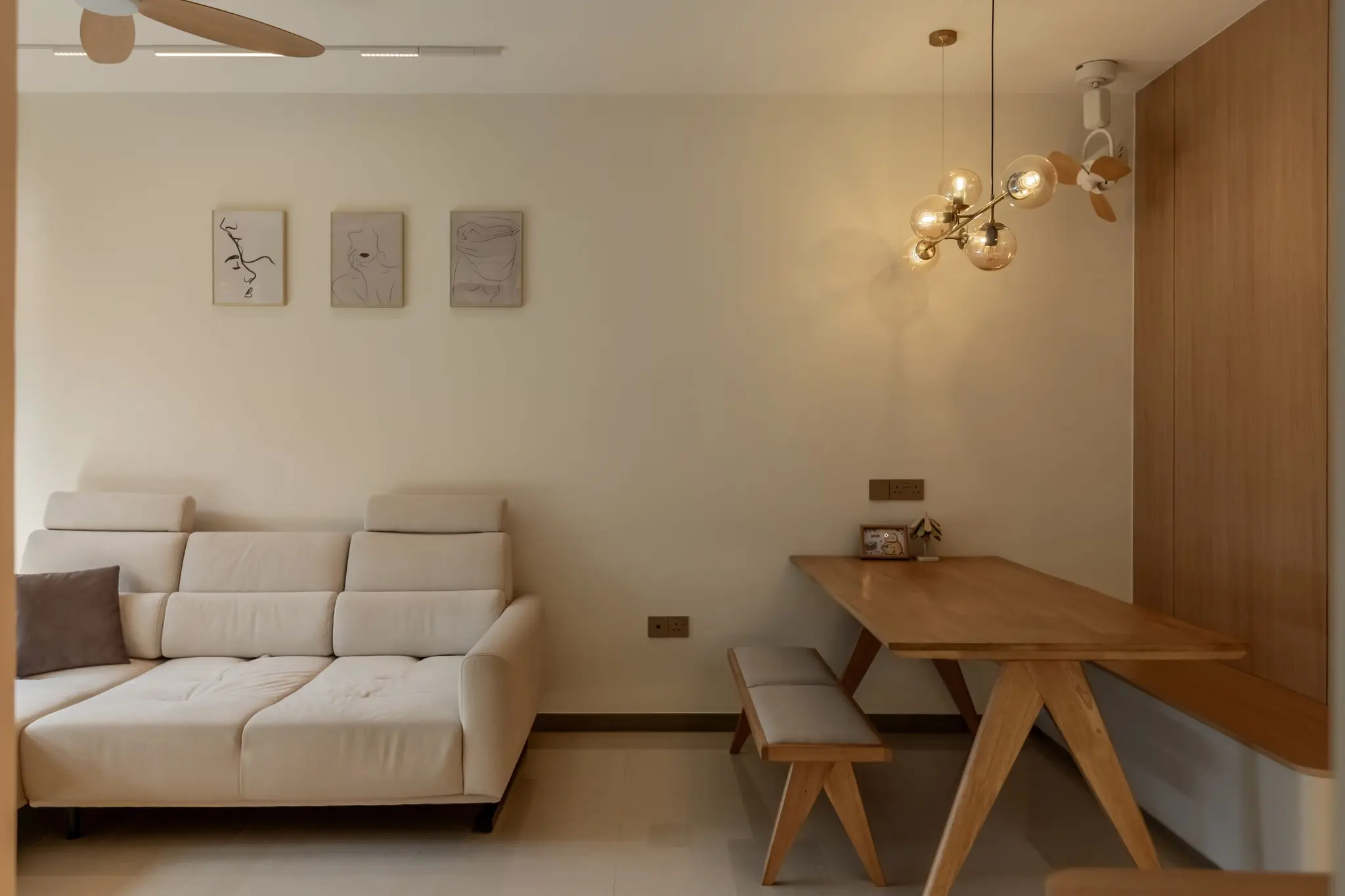 Dining table and sofa area at 220B Tengah Garden