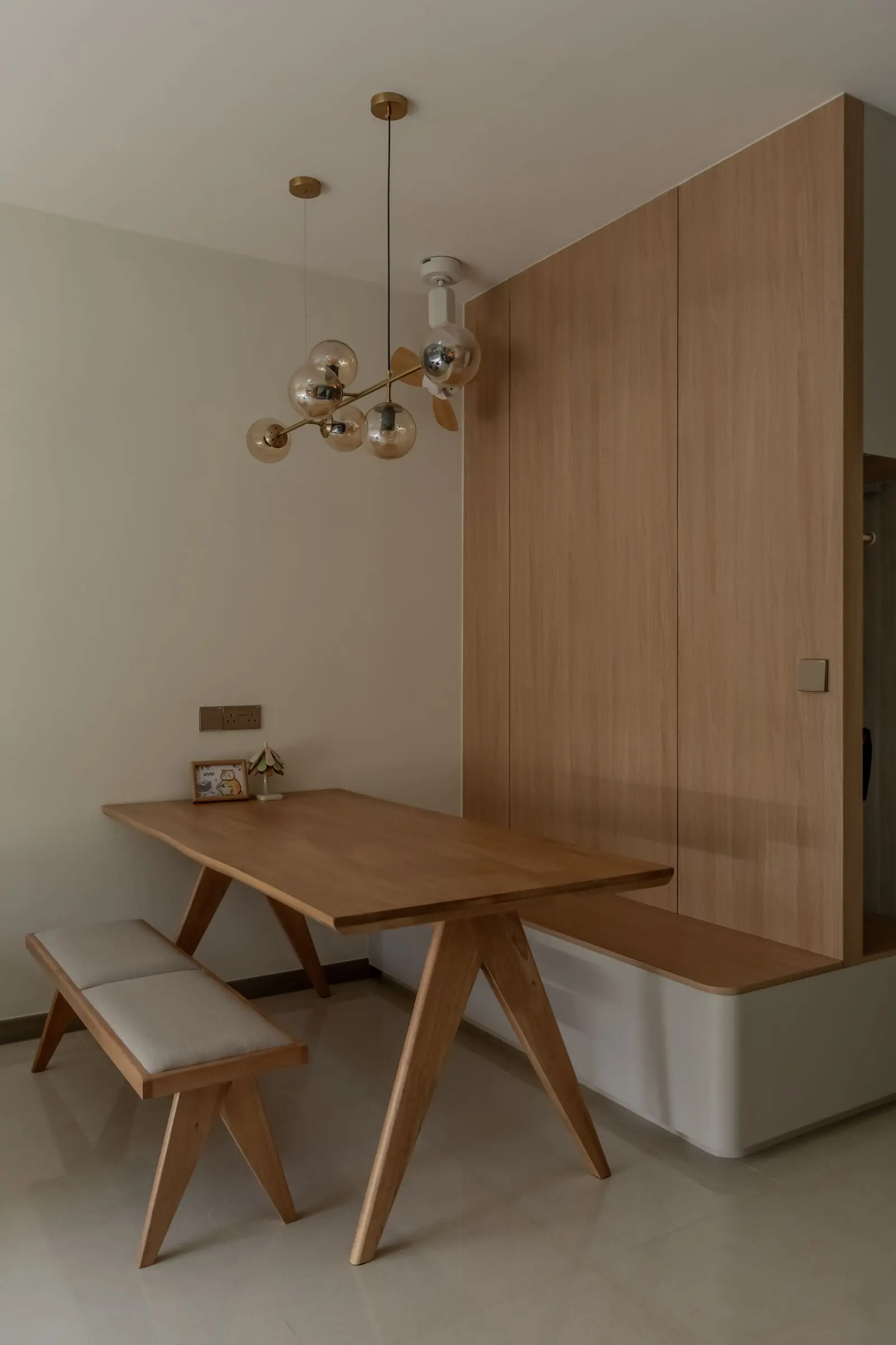 Vertical living room carpentry detail at 220B Tengah Garden