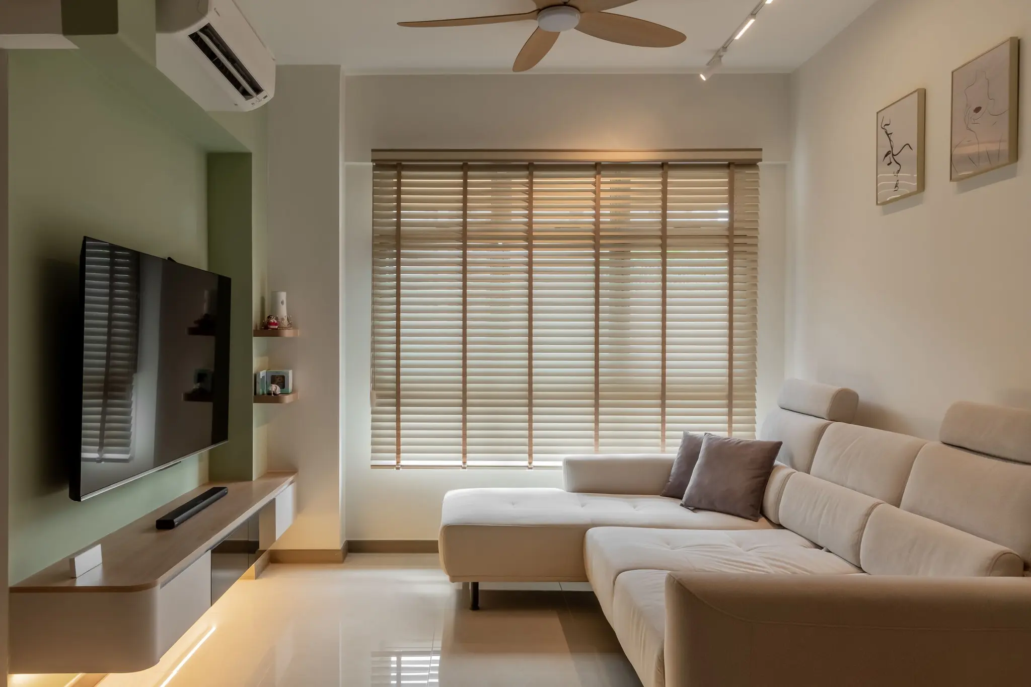 Sofa and TV wall in living room at 220B Tengah Garden