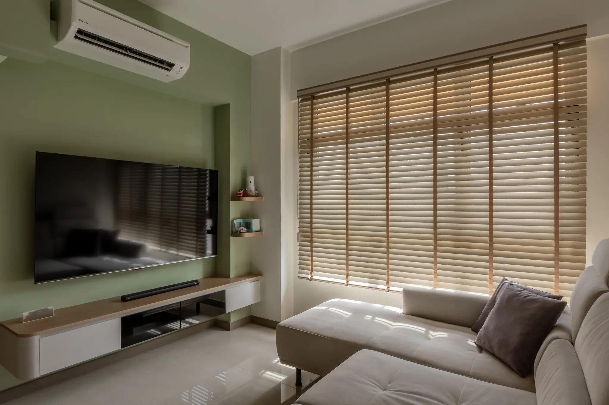 Living room media wall and blinds at 220B Tengah Garden