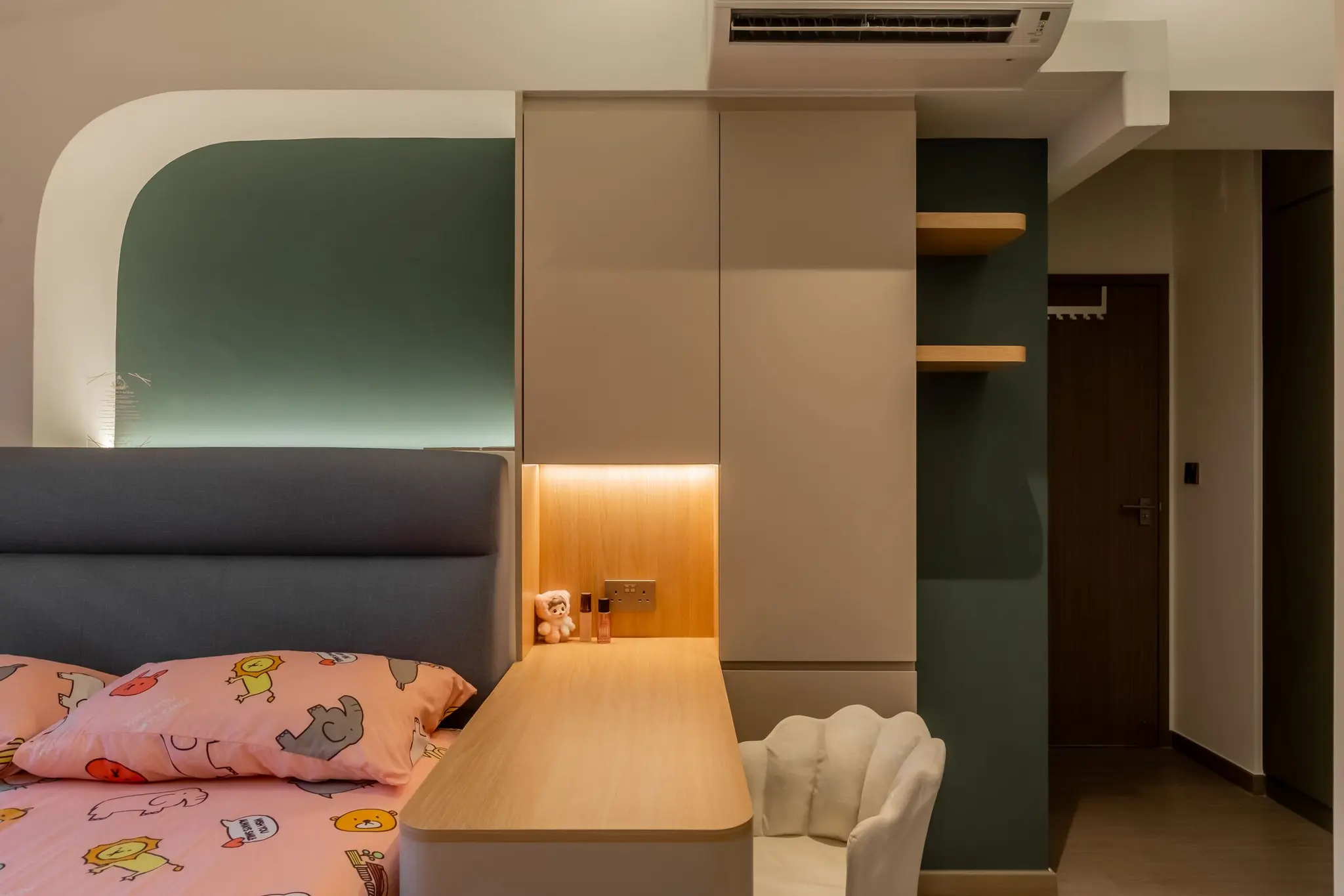Child bedroom with desk and sage accents at 220B Tengah Garden