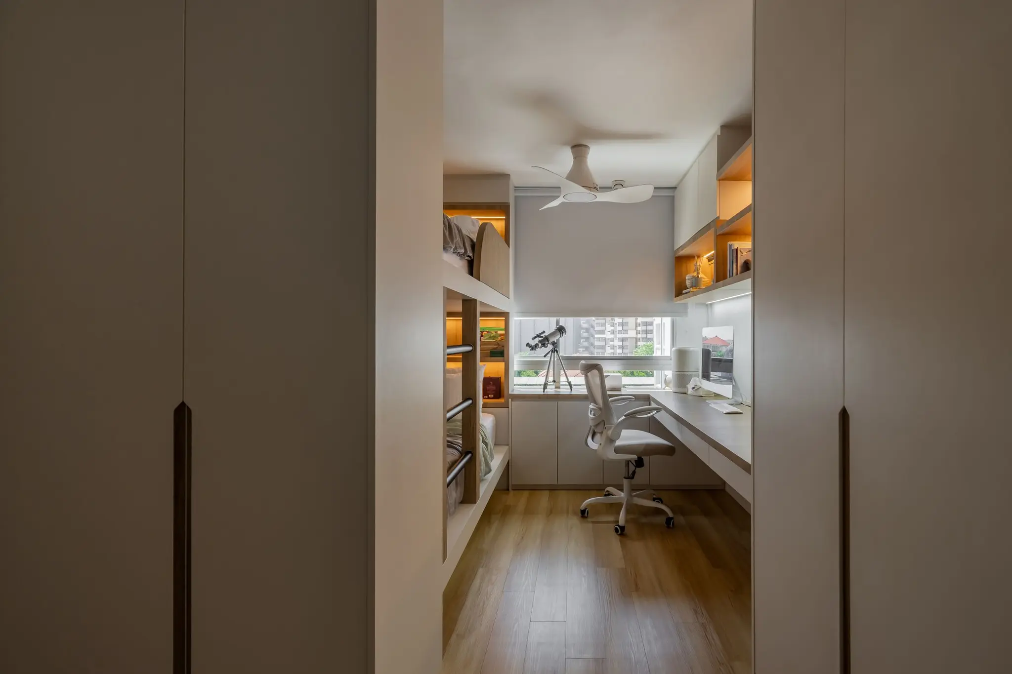Bedroom built-ins with bunk bed and storage at 248 Pasir Ris