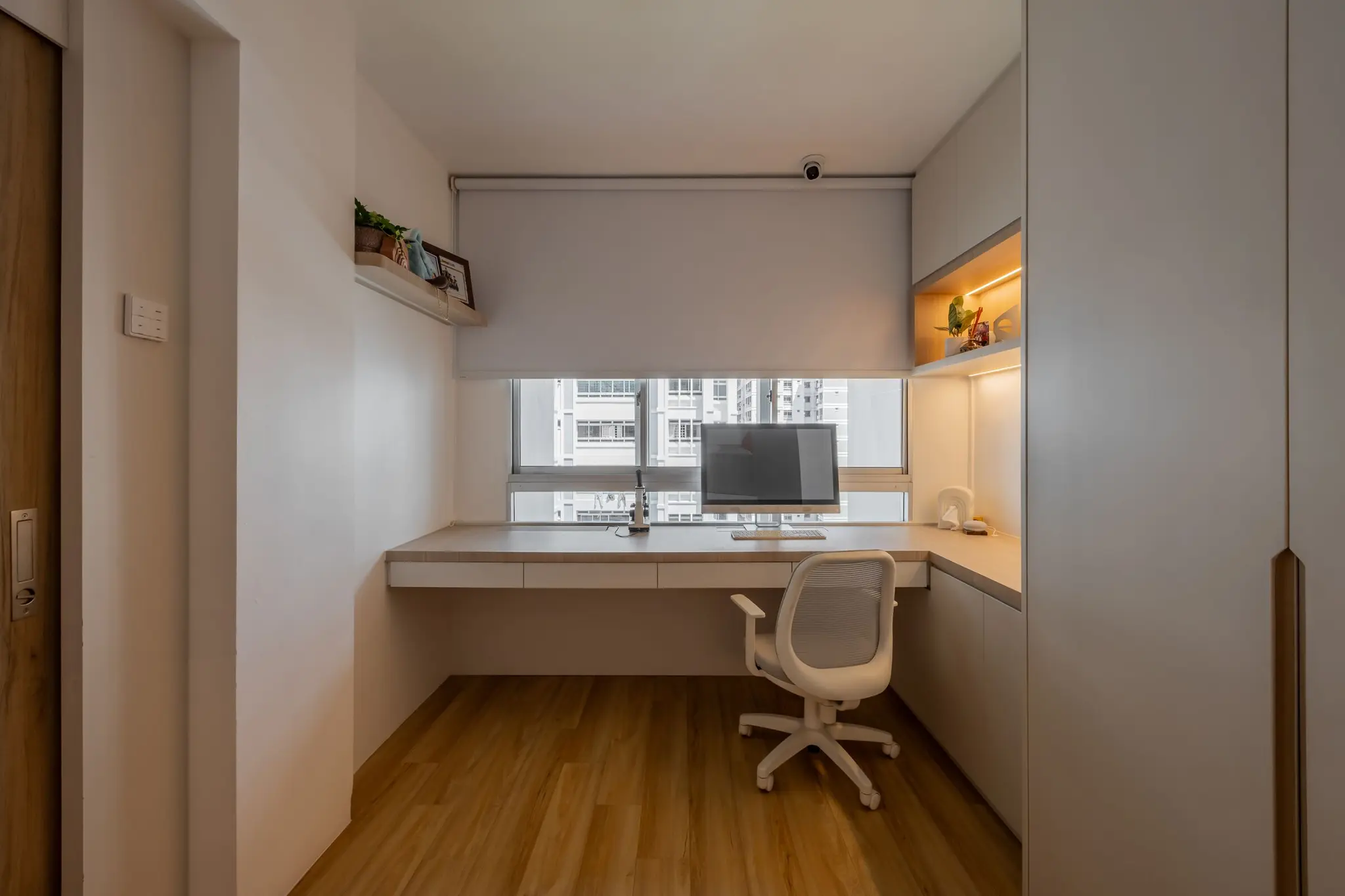 Study nook with warm shelf lighting at 248 Pasir Ris
