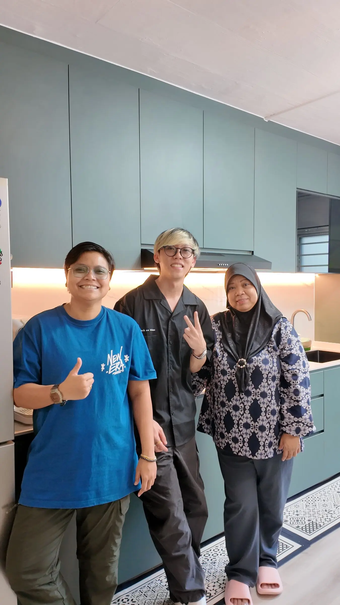 Home handover portrait in the renovated kitchen at 337 Bukit Batok