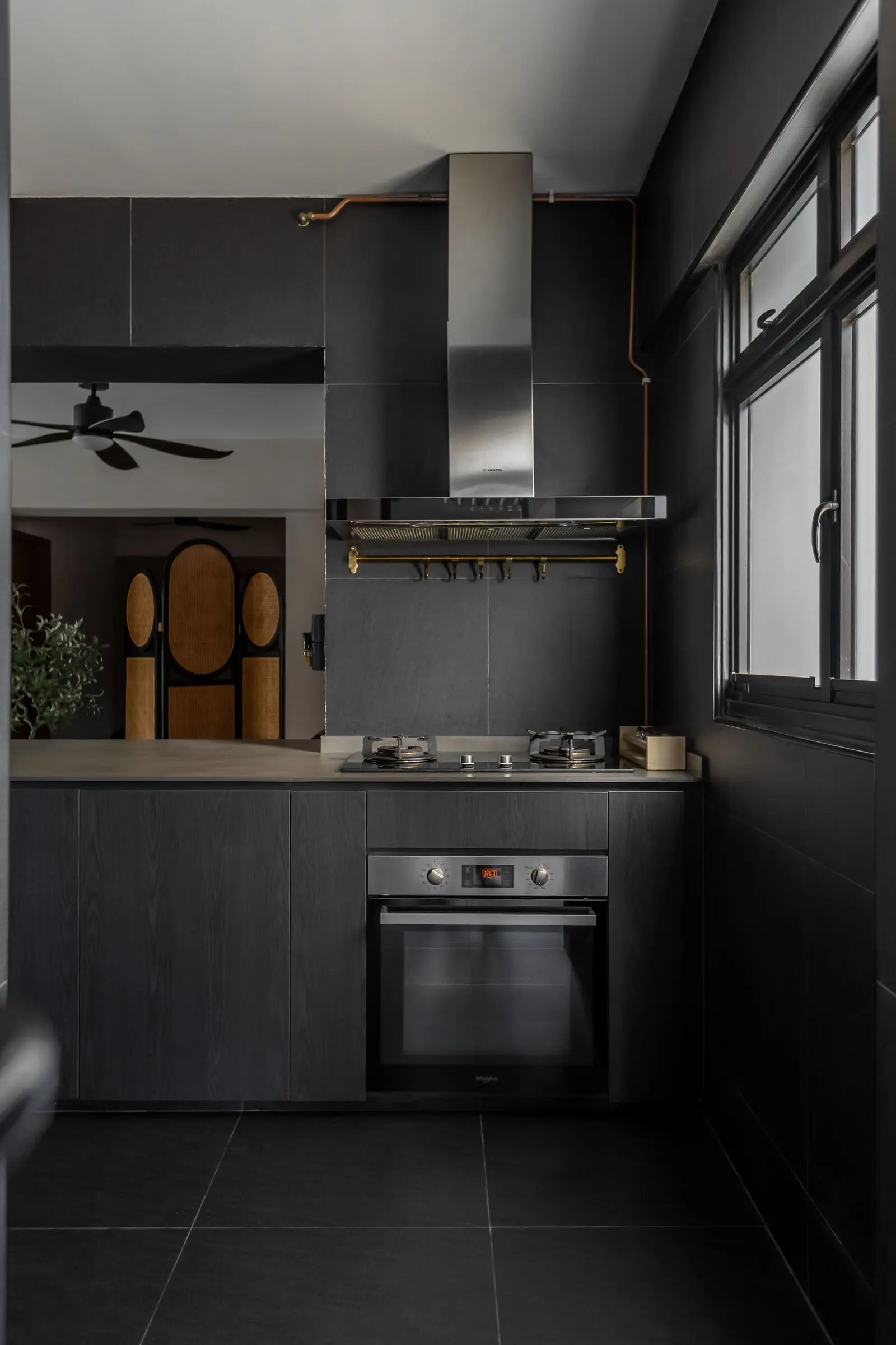 Vertical view of the black kitchen at 401A North Shore