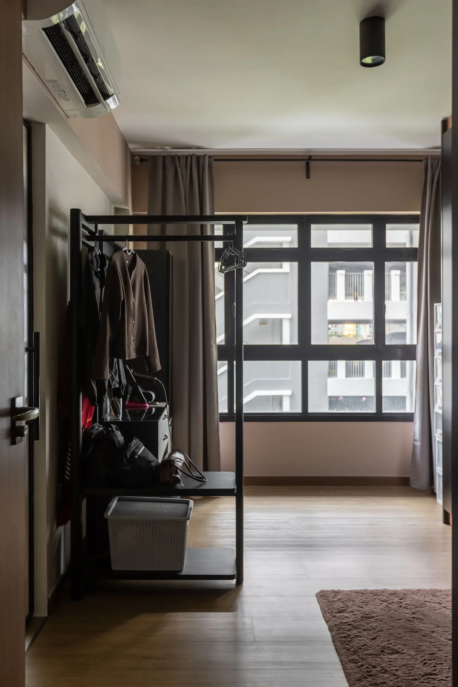 Bedroom wardrobe and window view at 401A North Shore