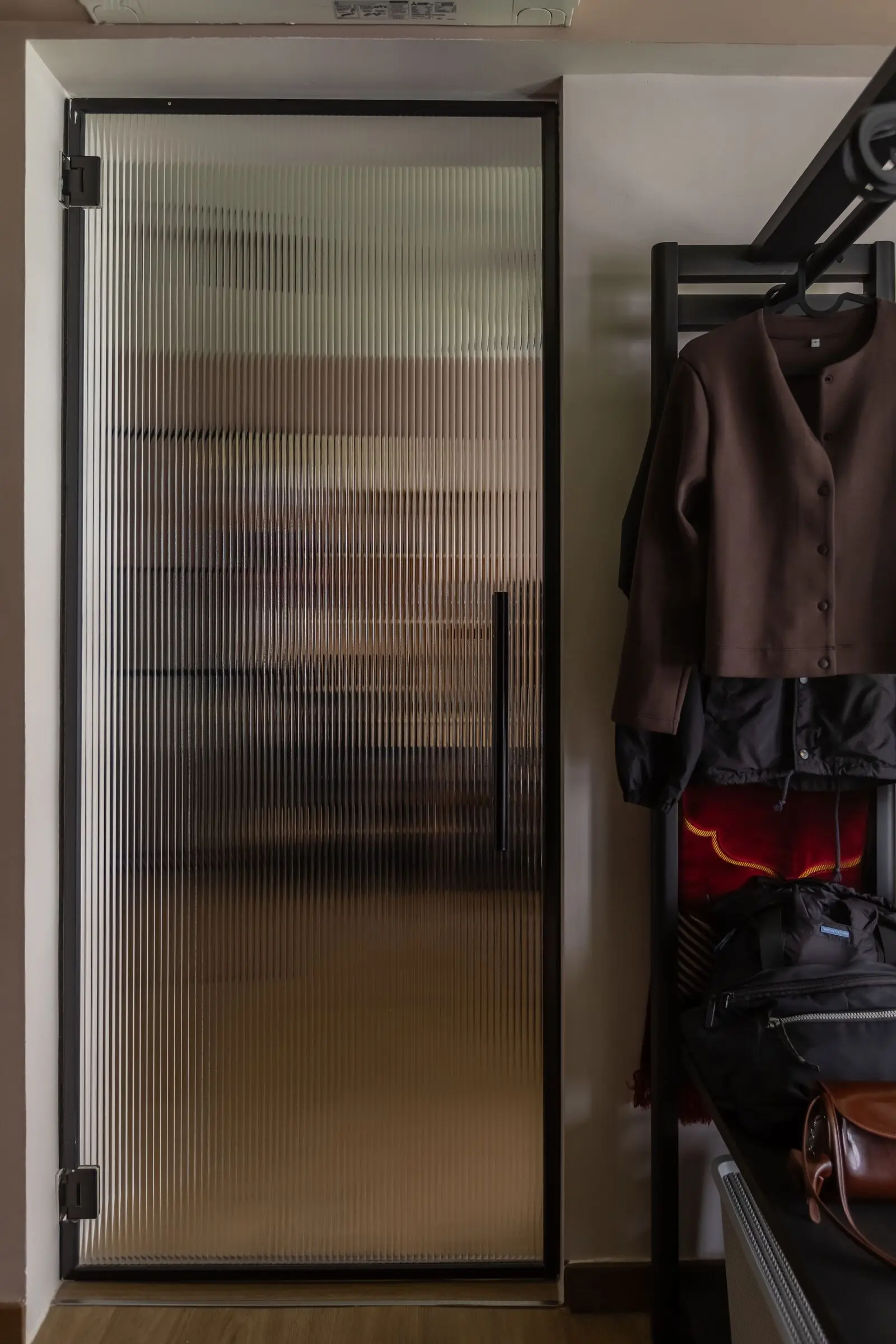 Frosted sliding door beside the wardrobe at 401A North Shore
