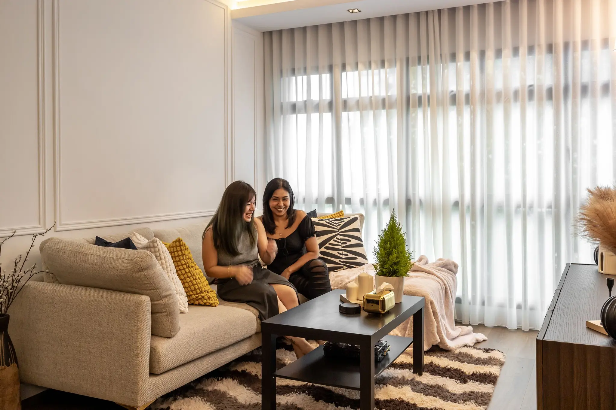 Homeowner portrait in renovated living room at 405A Fernvale Lane
