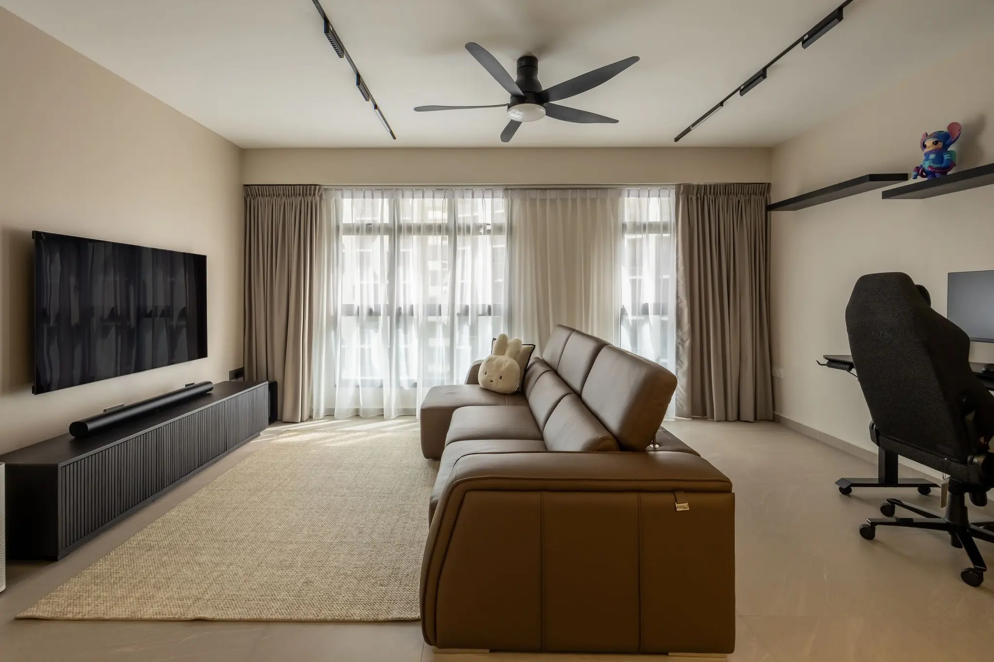 Kitchen cabinets and illuminated backsplash at 447A Punggol Way