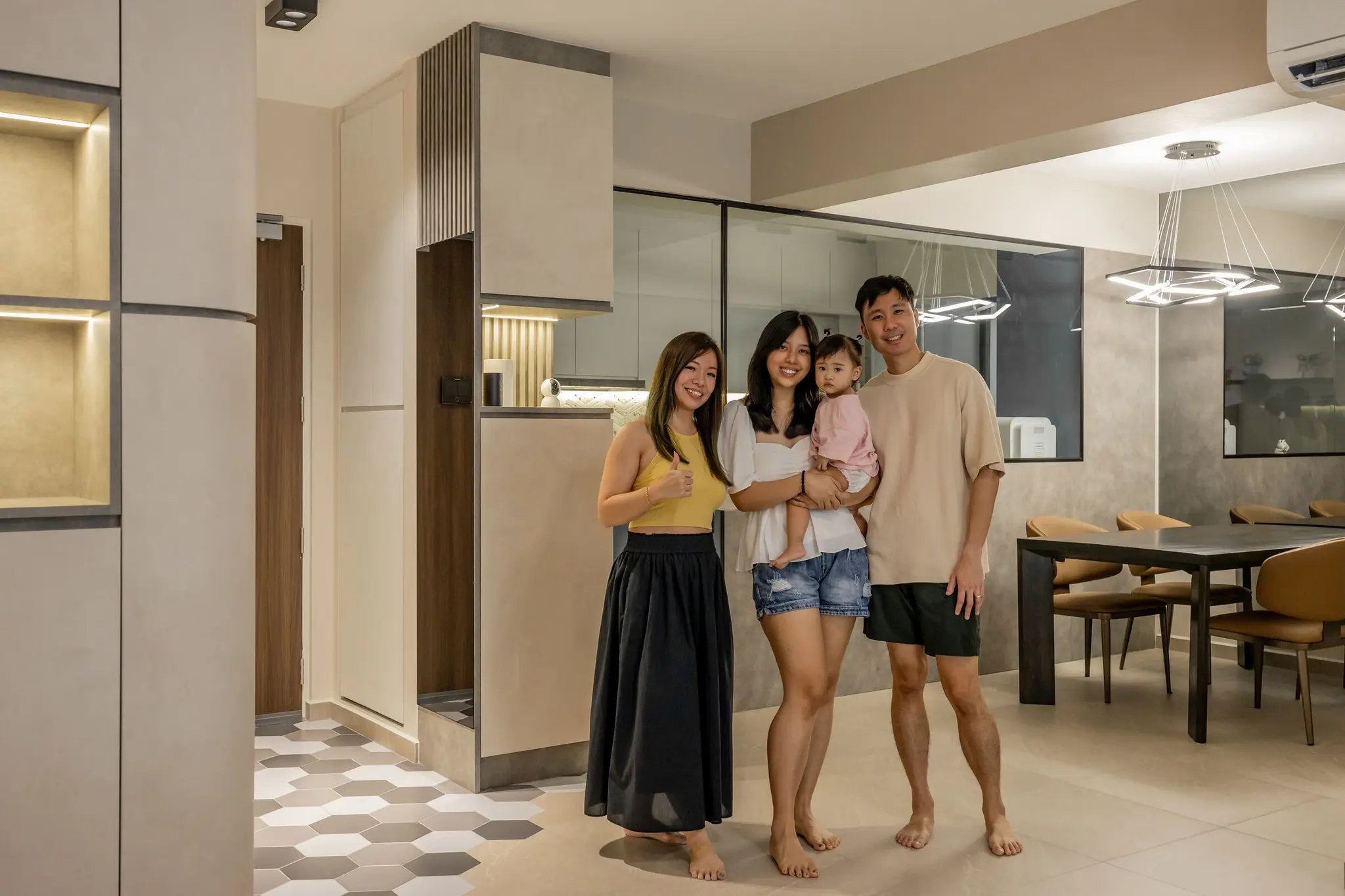 Homeowners in their renovated home at 447A Punggol Way