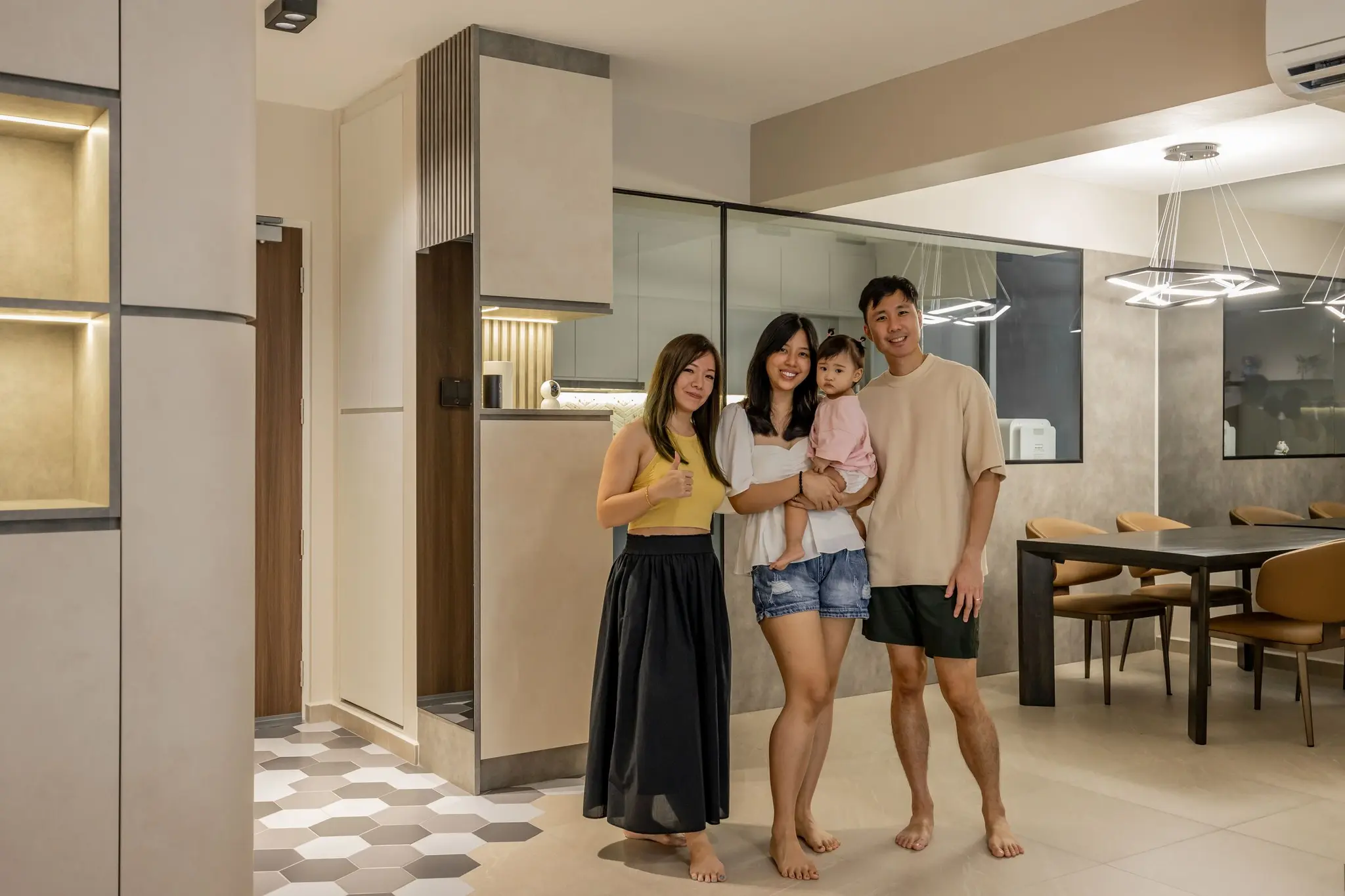 Family portrait in the dining area at 447A Punggol Way
