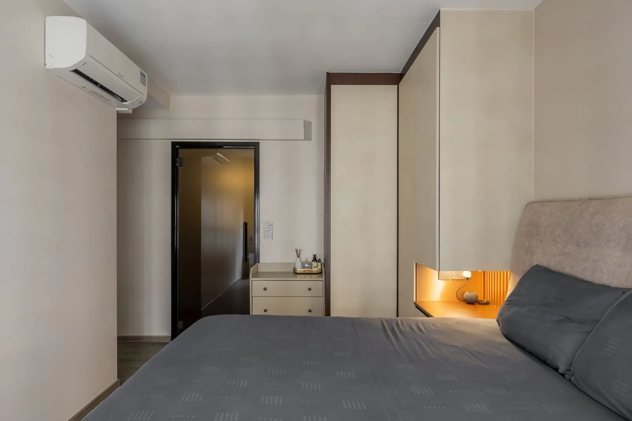 Bedroom with illuminated bedside niche at 447A Punggol Way