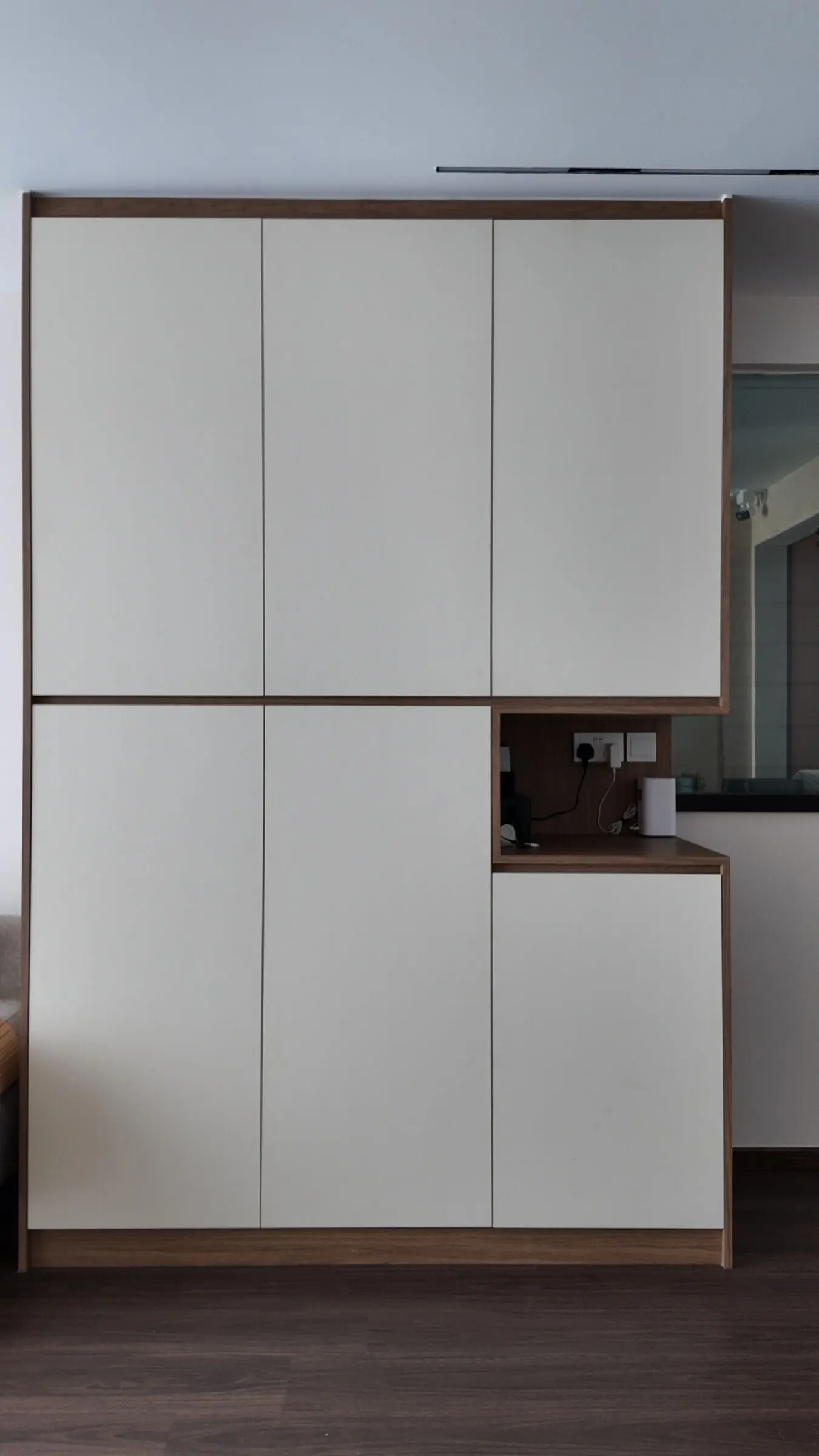 Vertical view of the living room storage wall at Lakeshore