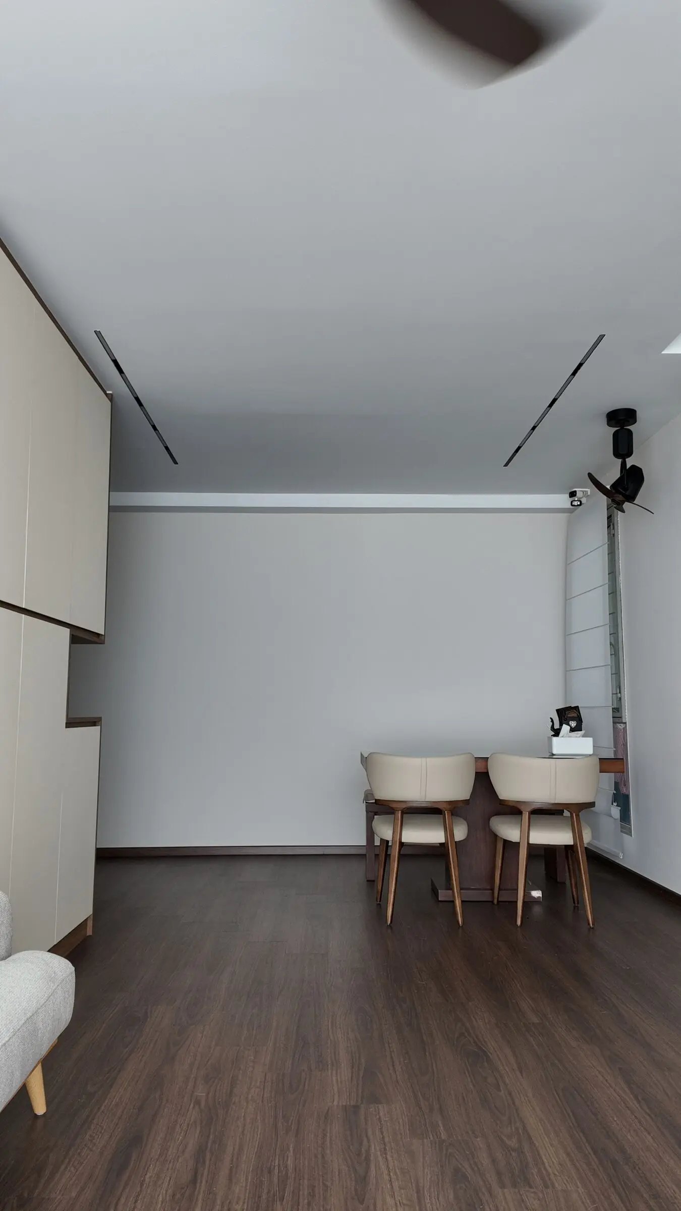 Vertical living and dining room view at Lakeshore