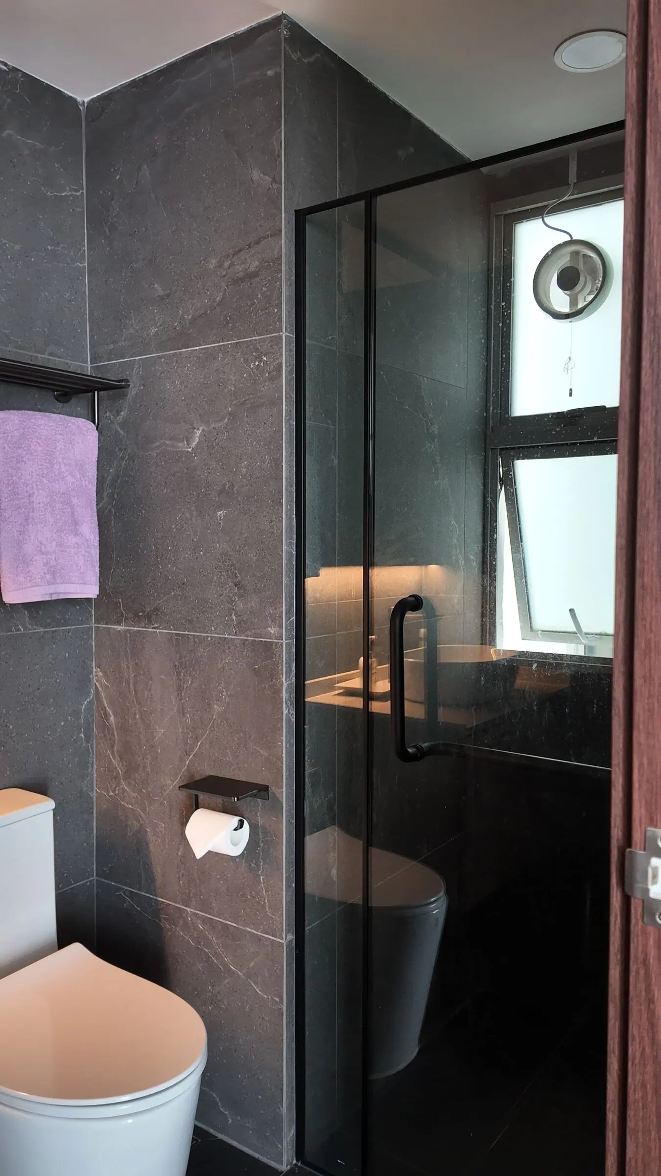 Vertical bathroom mirror and vanity detail at Lakeshore