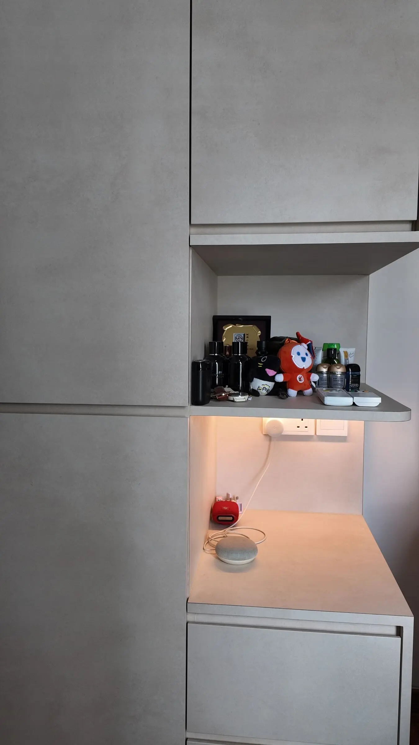 Illuminated display niche in bedroom storage at Lakeshore