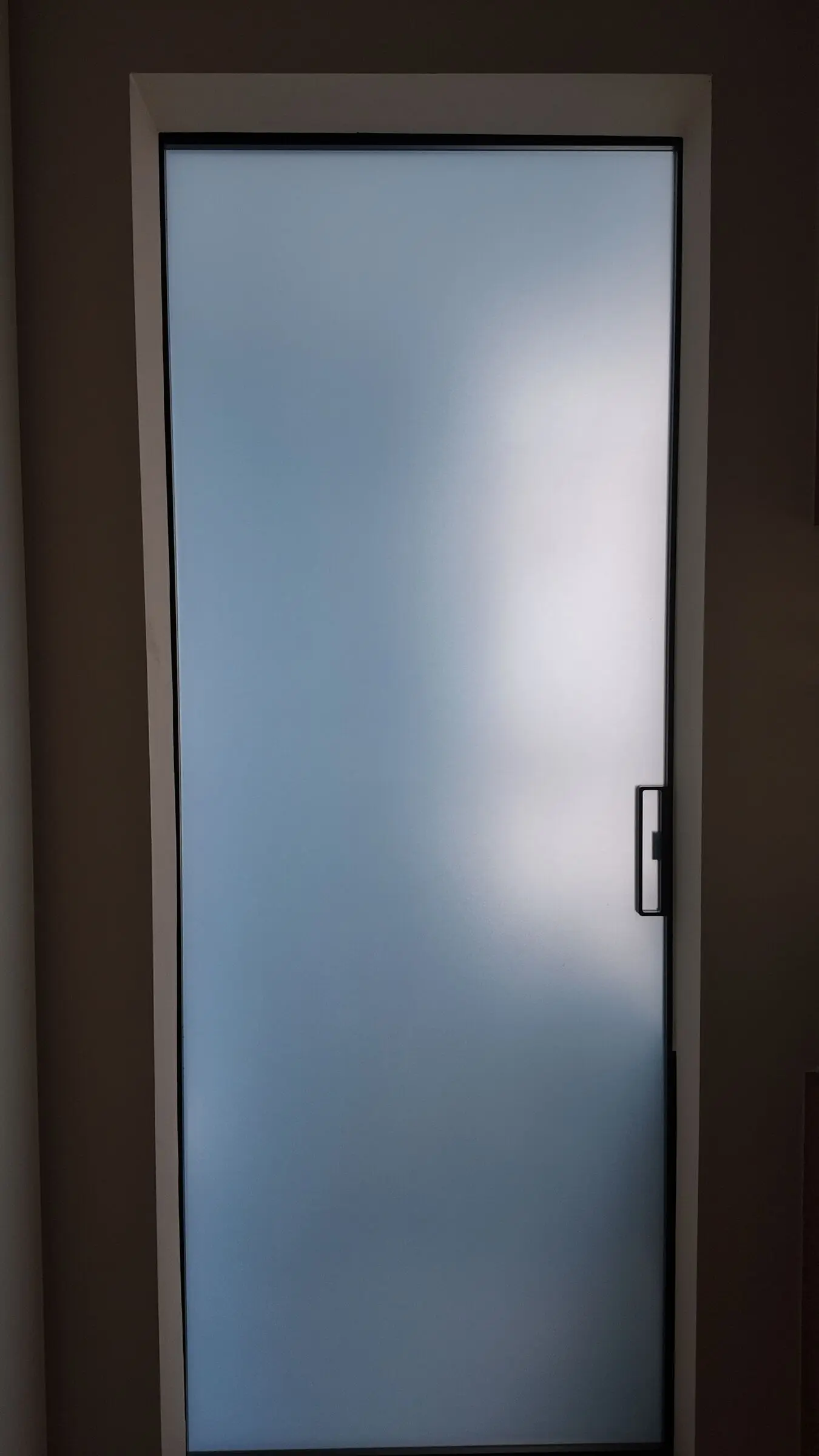Vertical shower and bathroom window detail at Lakeshore