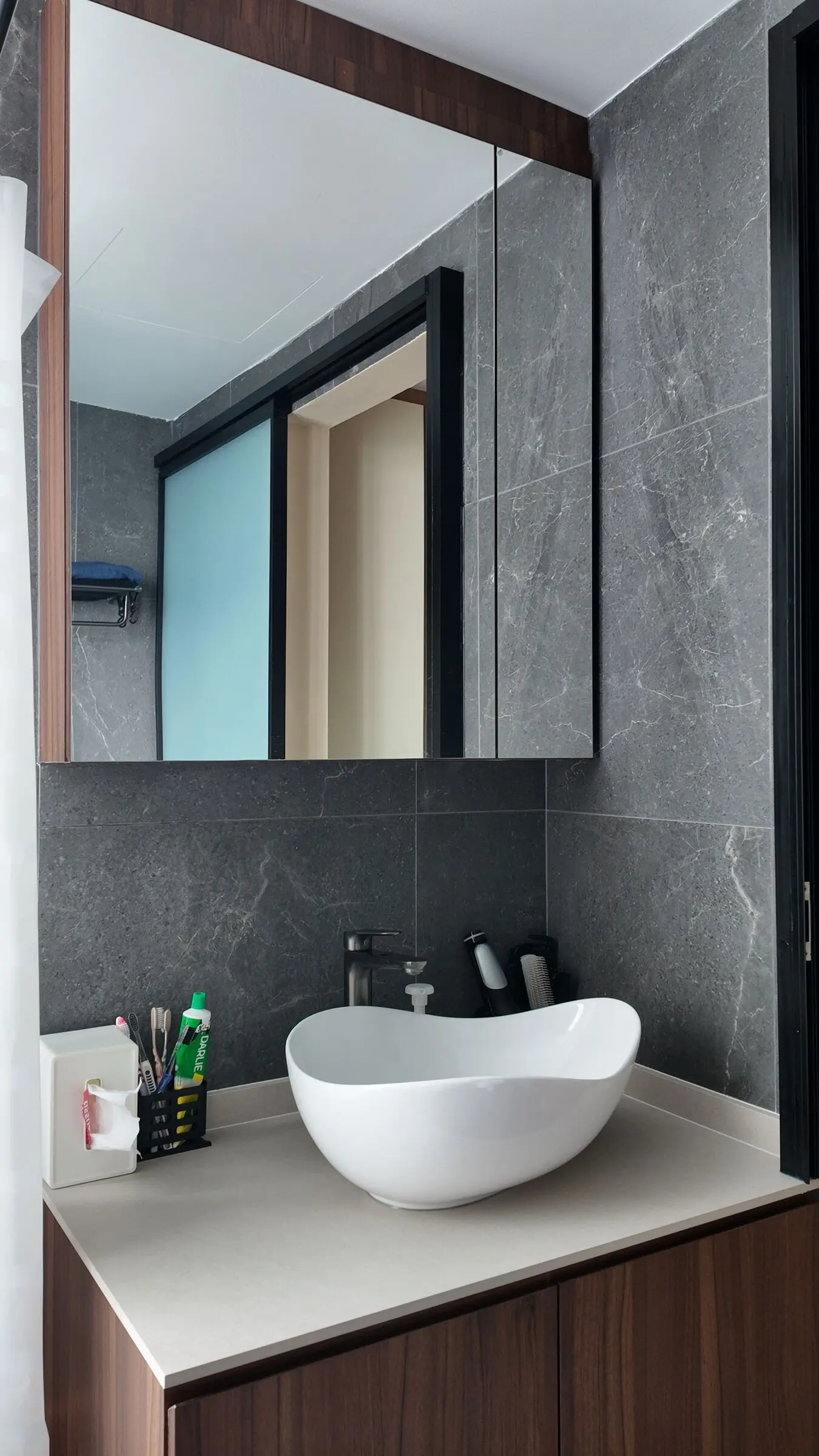 Vertical bathroom mirror and basin detail at Lakeshore